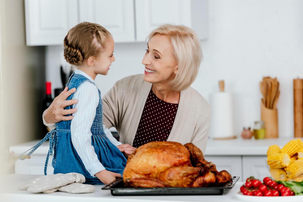 mom and daughter preparing thanksgiving