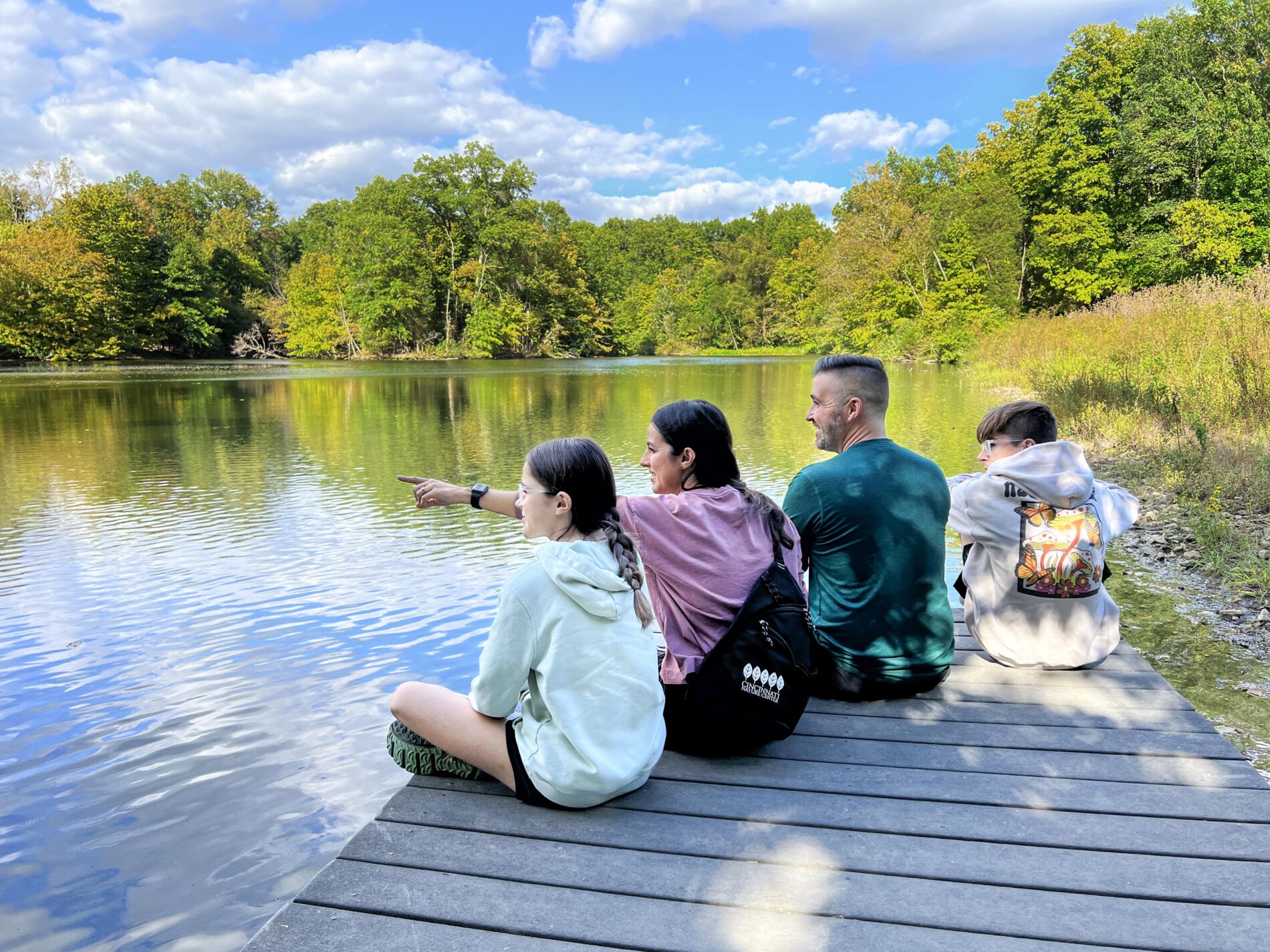 people sitting on a dock at Cincinnati Nature Center