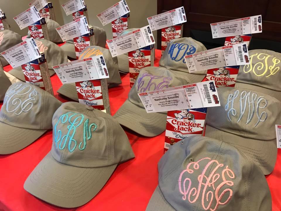 embroidered hats and baseball tickets