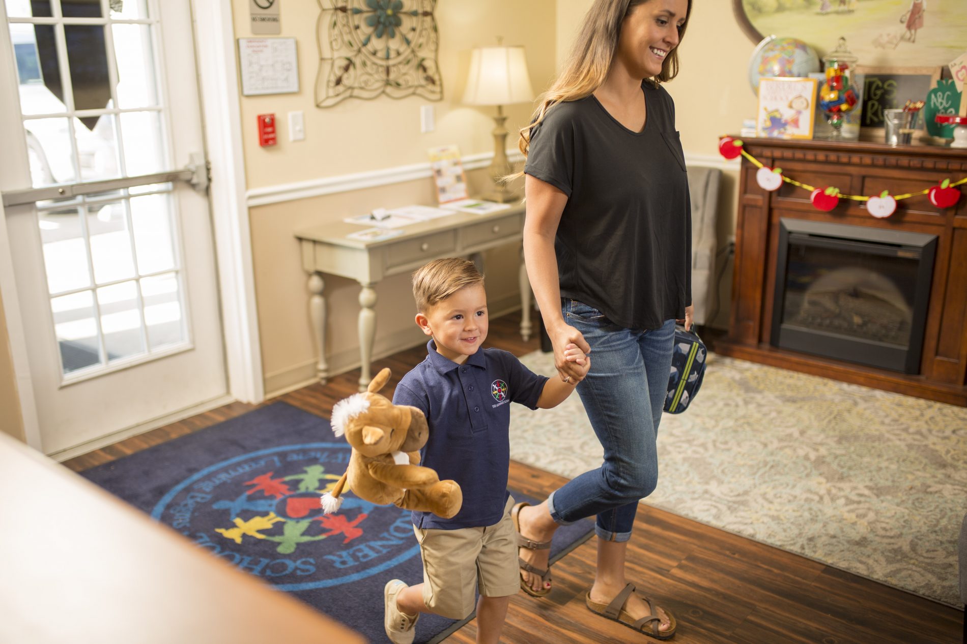 preschooler at drop off with mom