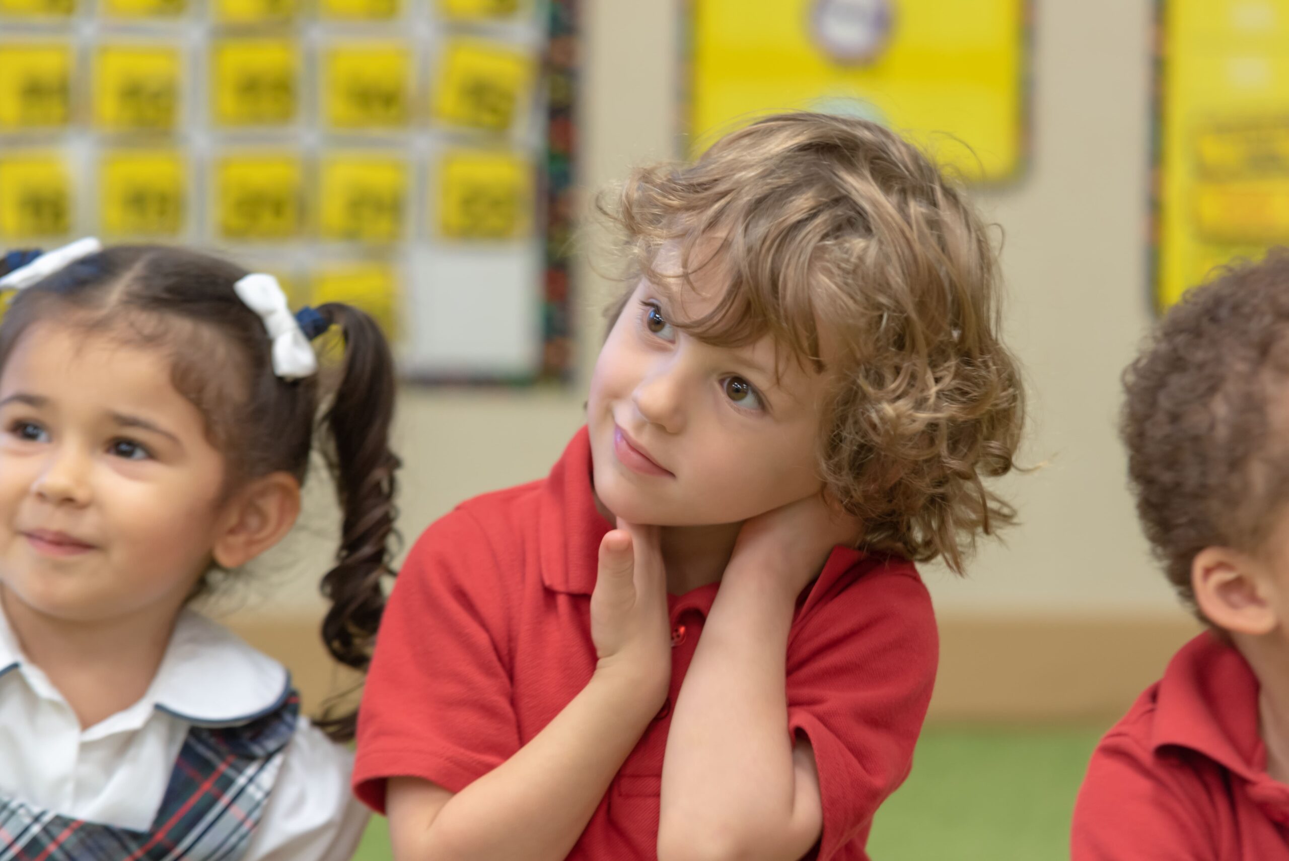 children sitting quietly and listening