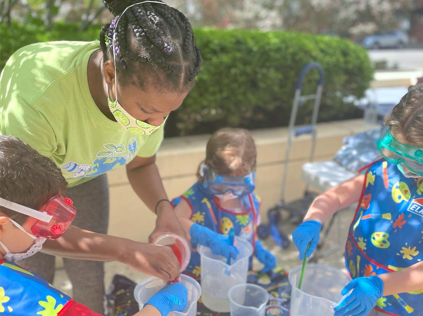 preschool-teacher-and-students-summer-activity