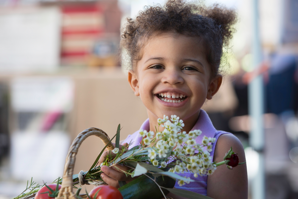 Cute Young Girl at Farmers Market