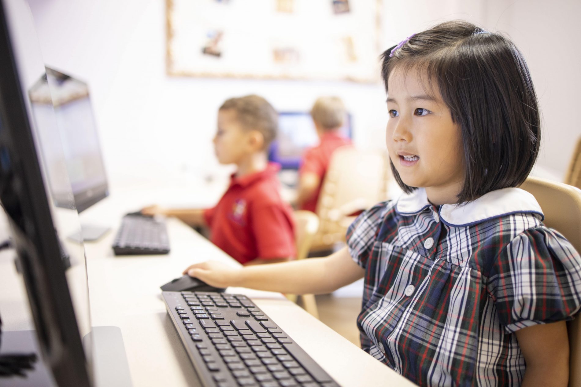 preschoolers using computers at The Gardner School