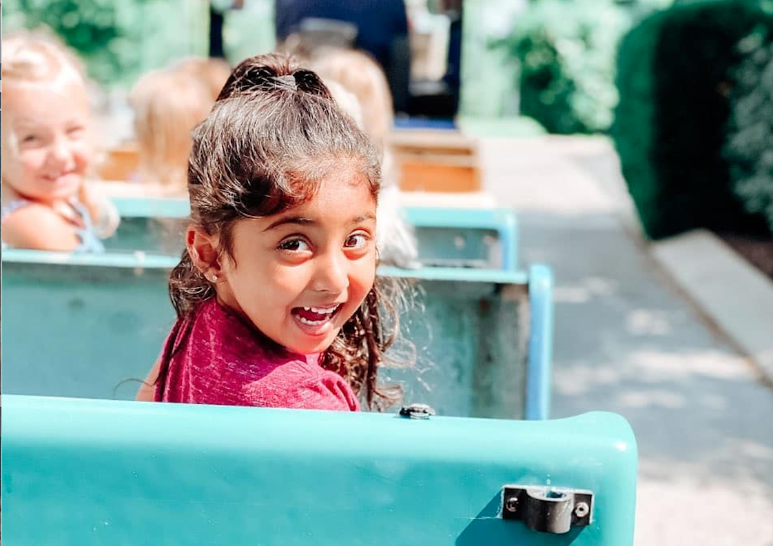 preschool-girl-riding-train