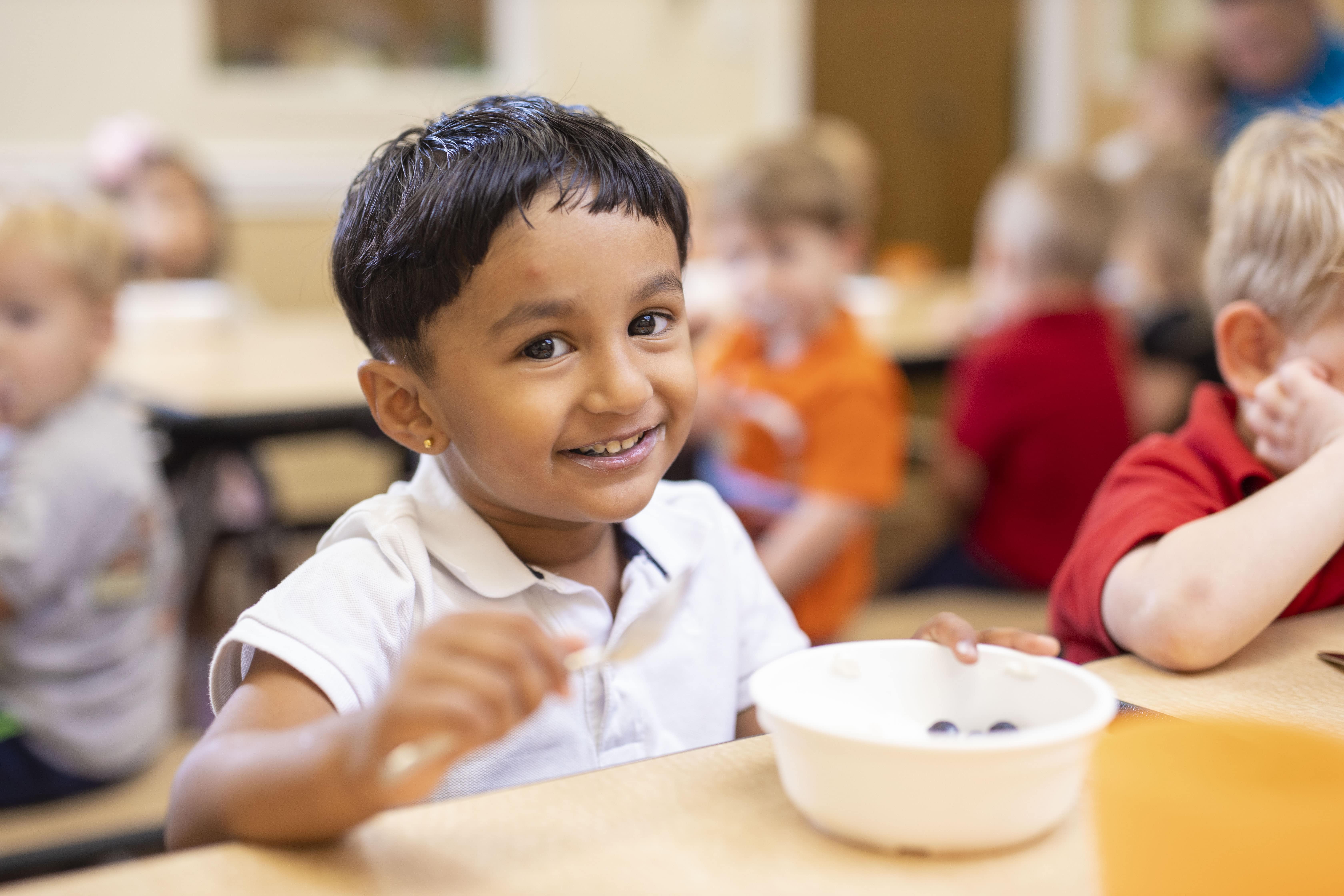 indian-american-preschool-child-eating-lunch
