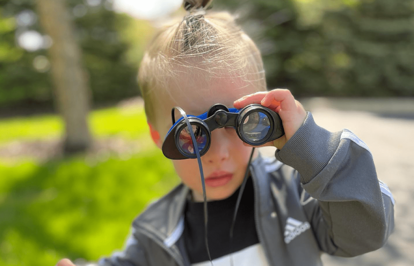 preschool-boy-exploring-outdoors