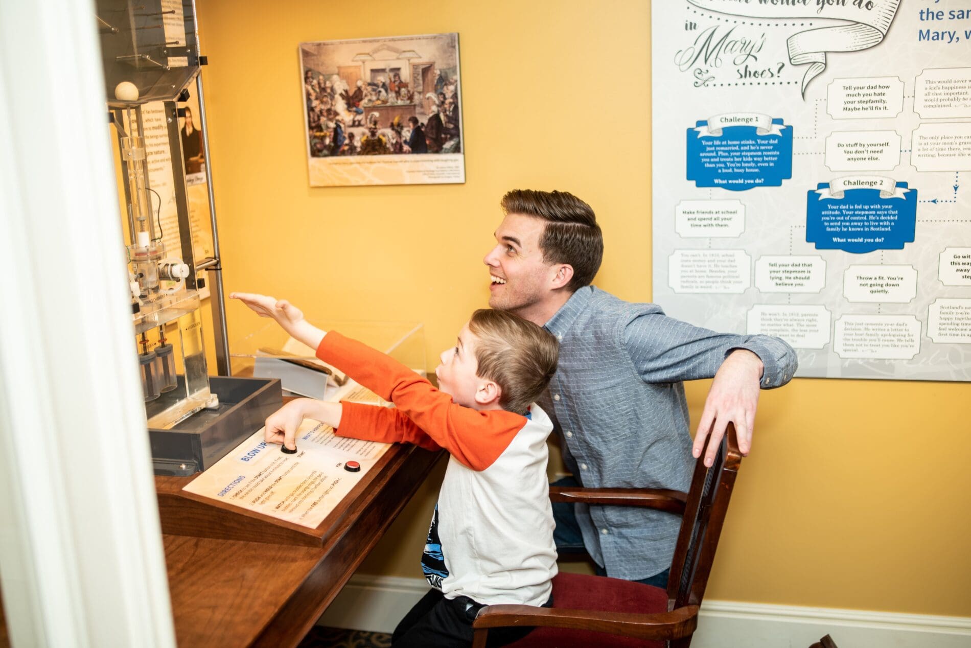 man and boy exploring Bakken Museum in MN