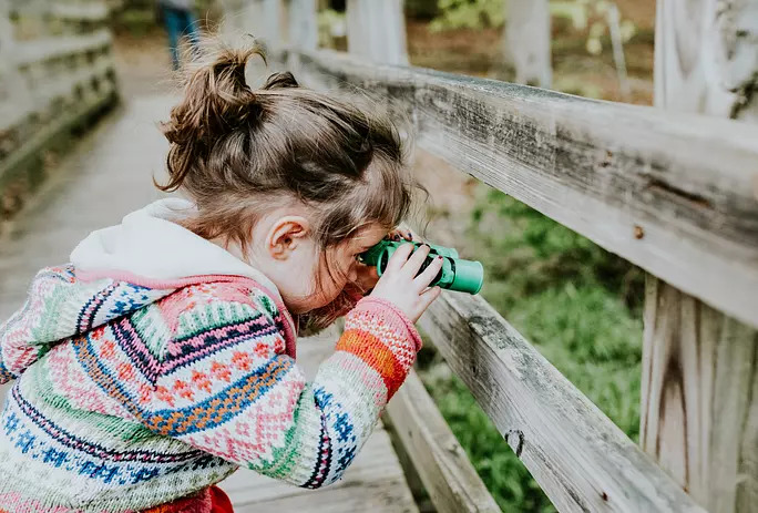 Toddler using binoculars Outdoor Activities DTC