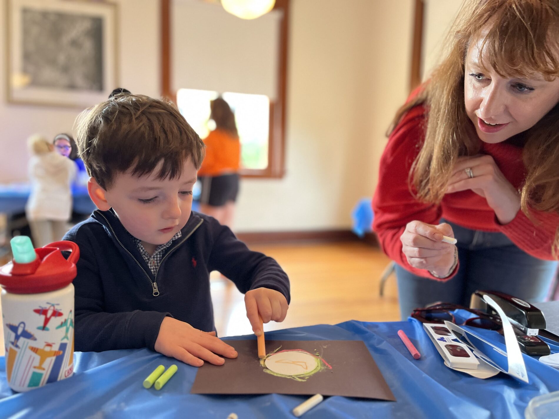 boy drawing with chalk at Cincinnati Observatory