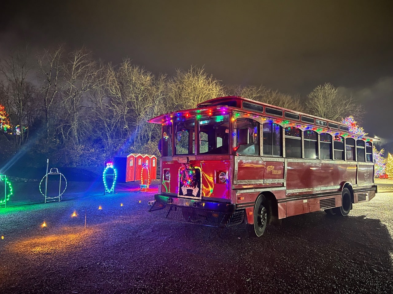 hello trolley decorated with holiday lights