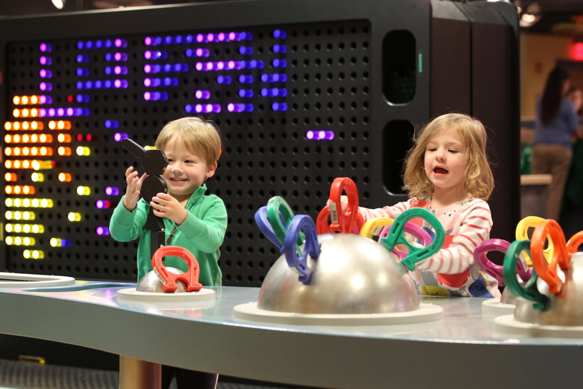 kids playing with an exhibit at The Exploritorium in Skokie