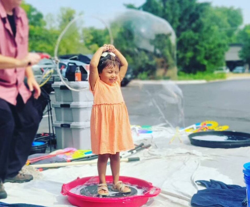 Children playing with bubbles