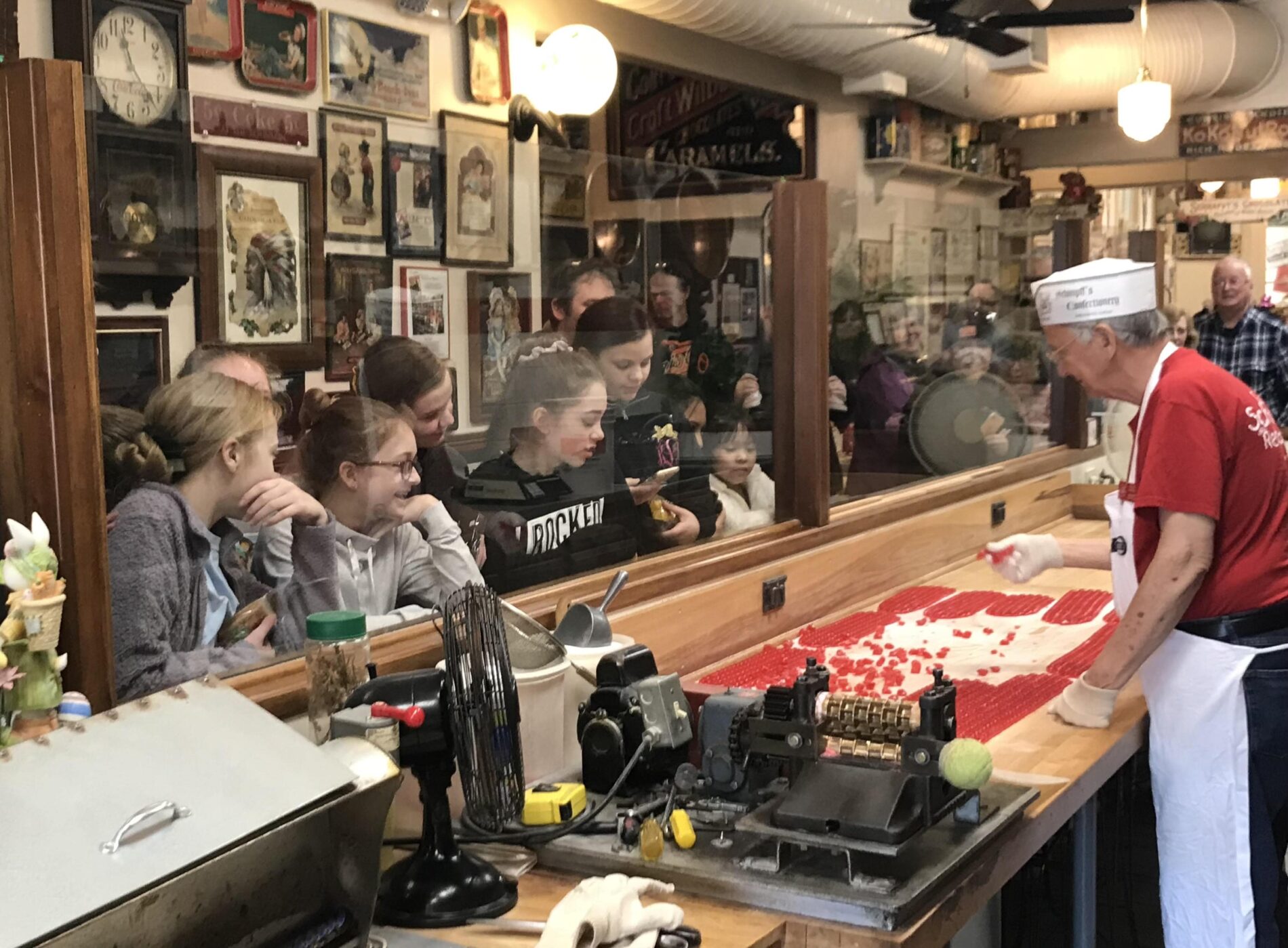 children watch candy being made at Schimpff's Confectionery