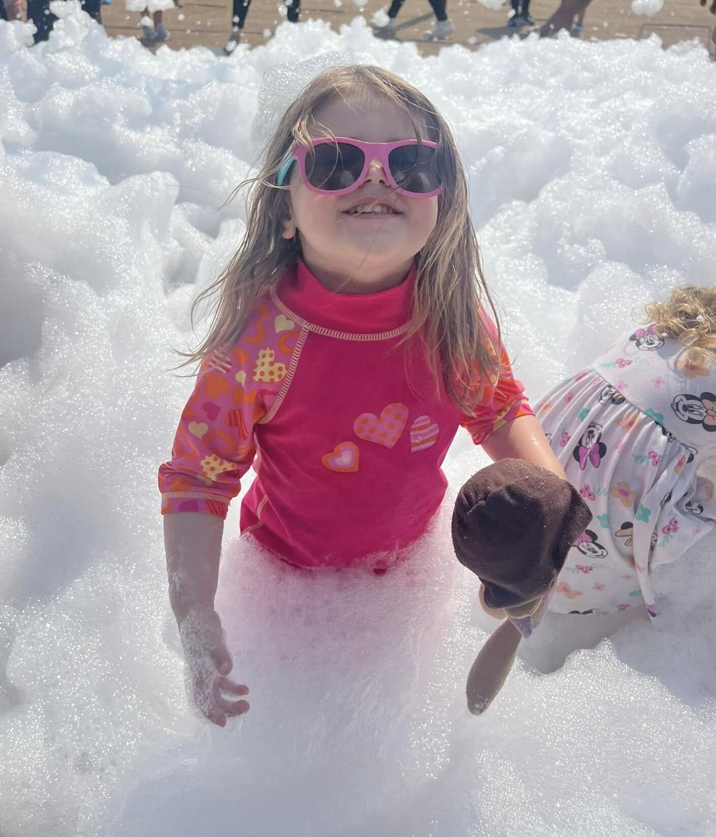 tgs student playing in bubble foam party