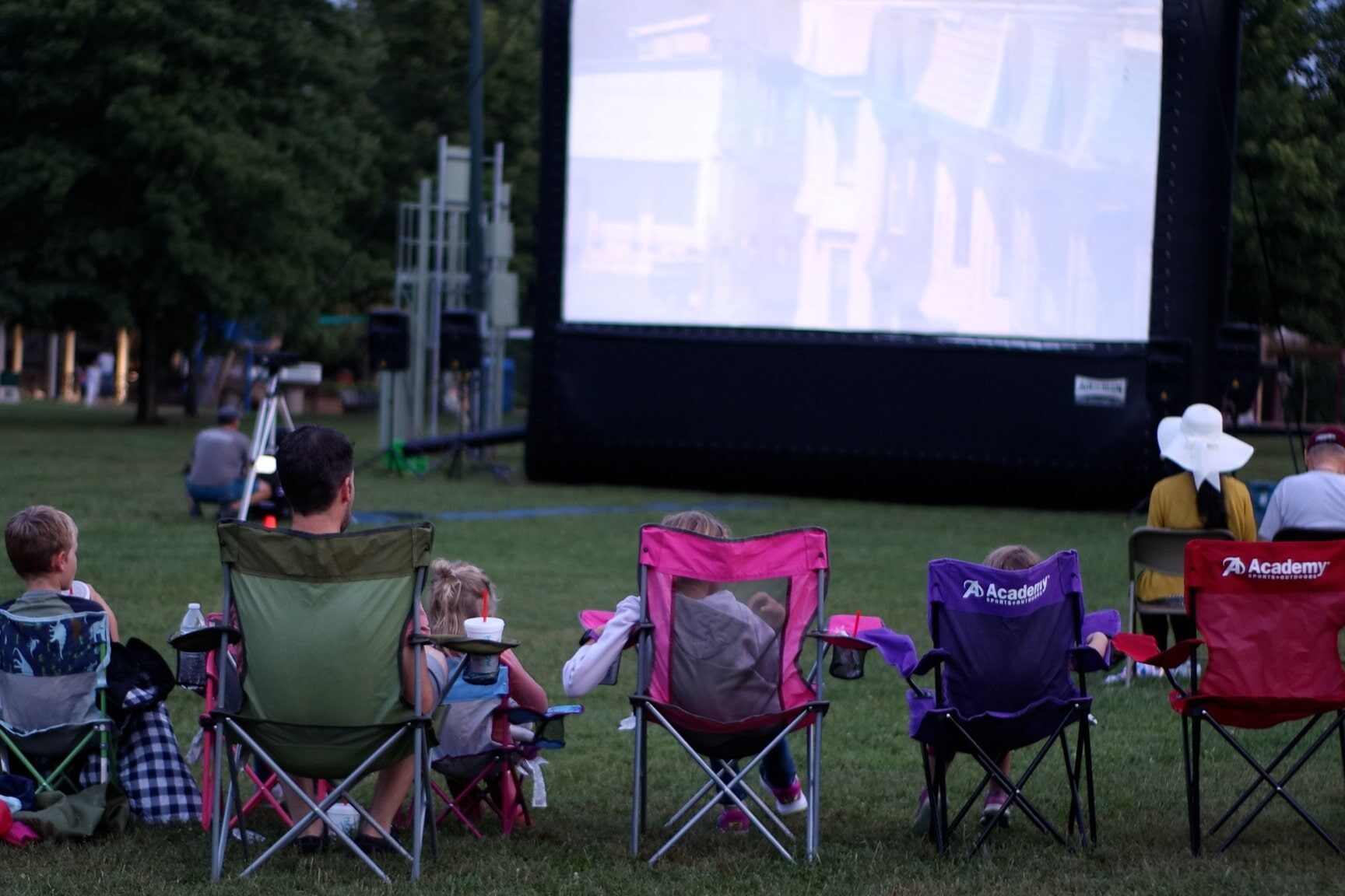 families sitting for Movies in the Park in Franklin TN