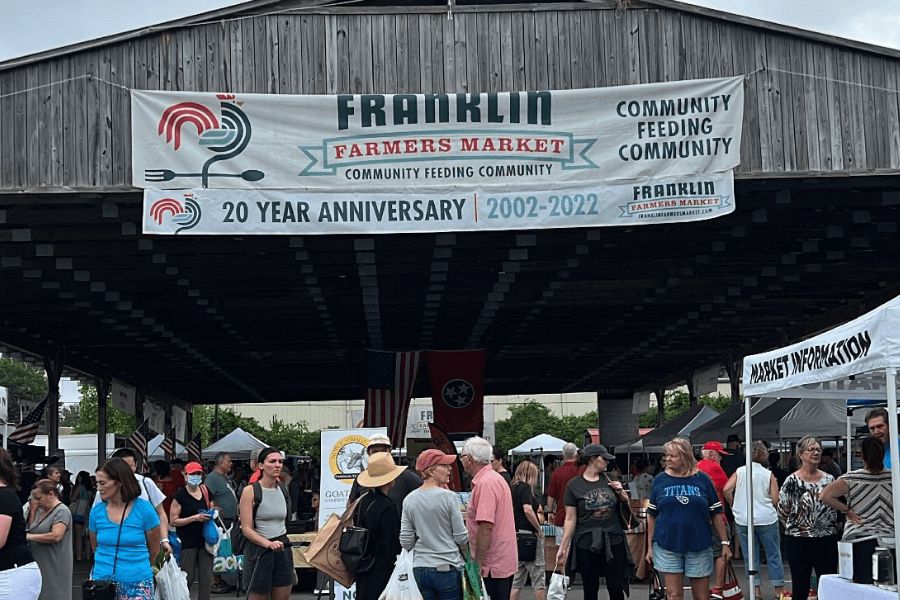 Crowd walking around the Franklin Farmers Market.
