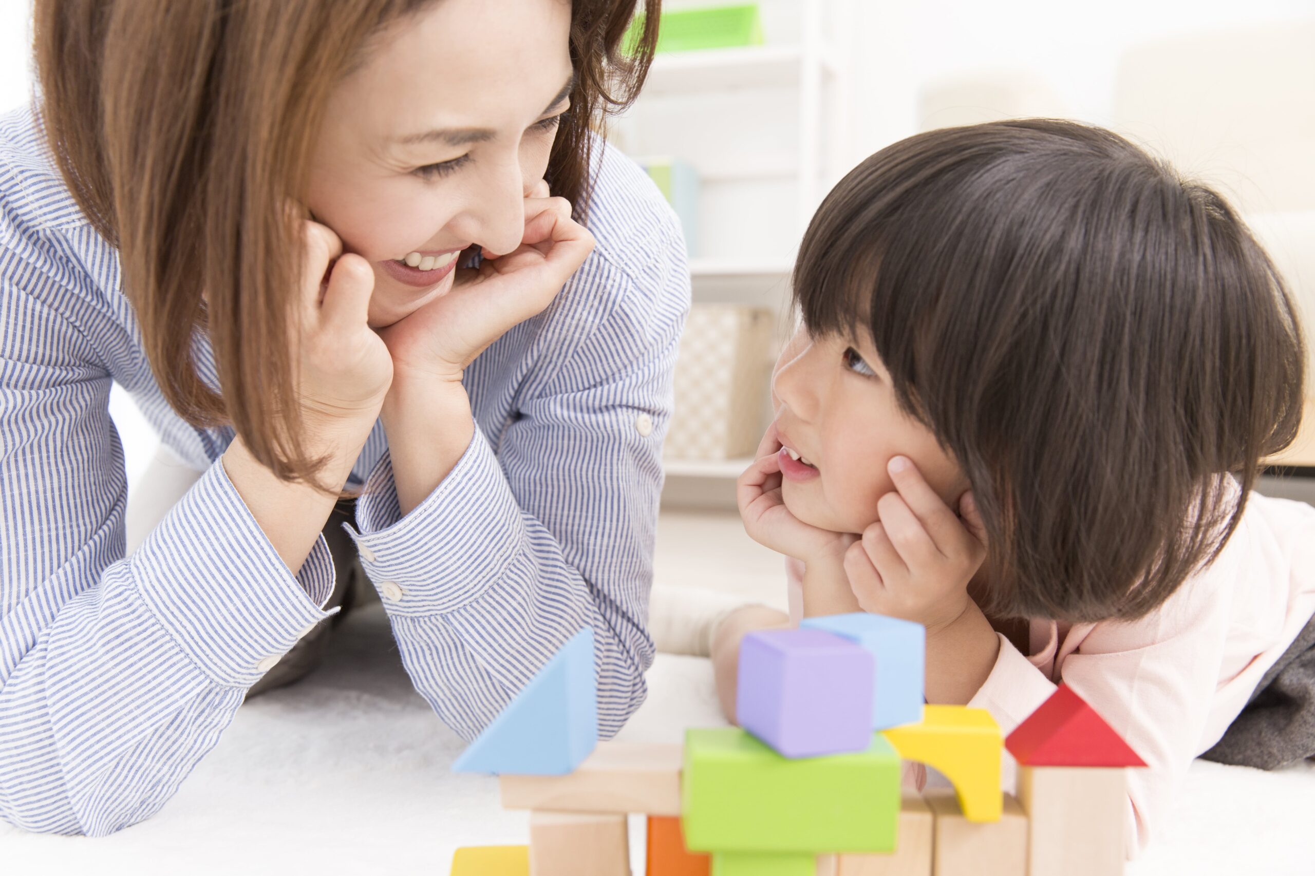 parent having conversation with preschool child