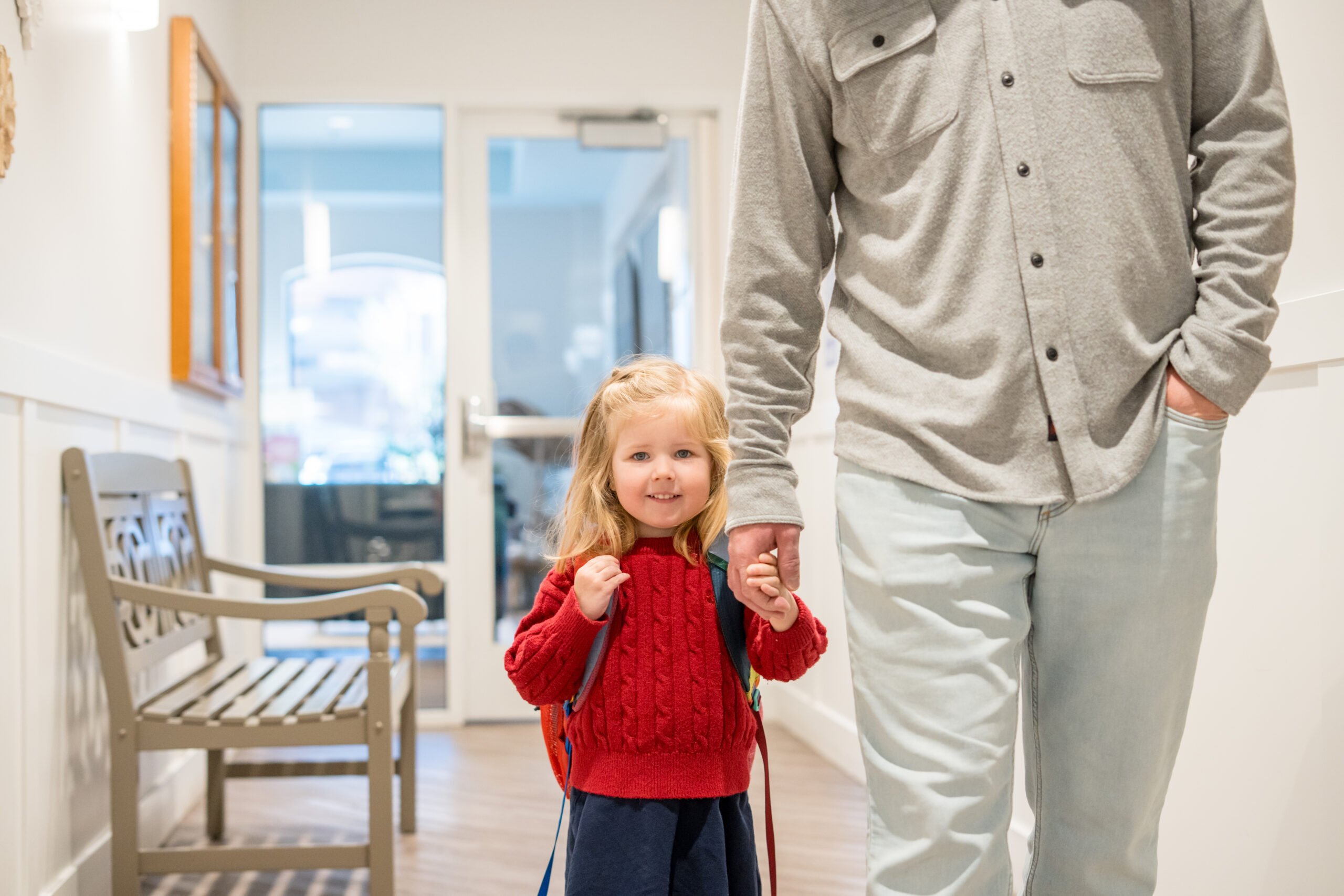 Child with father at preschool