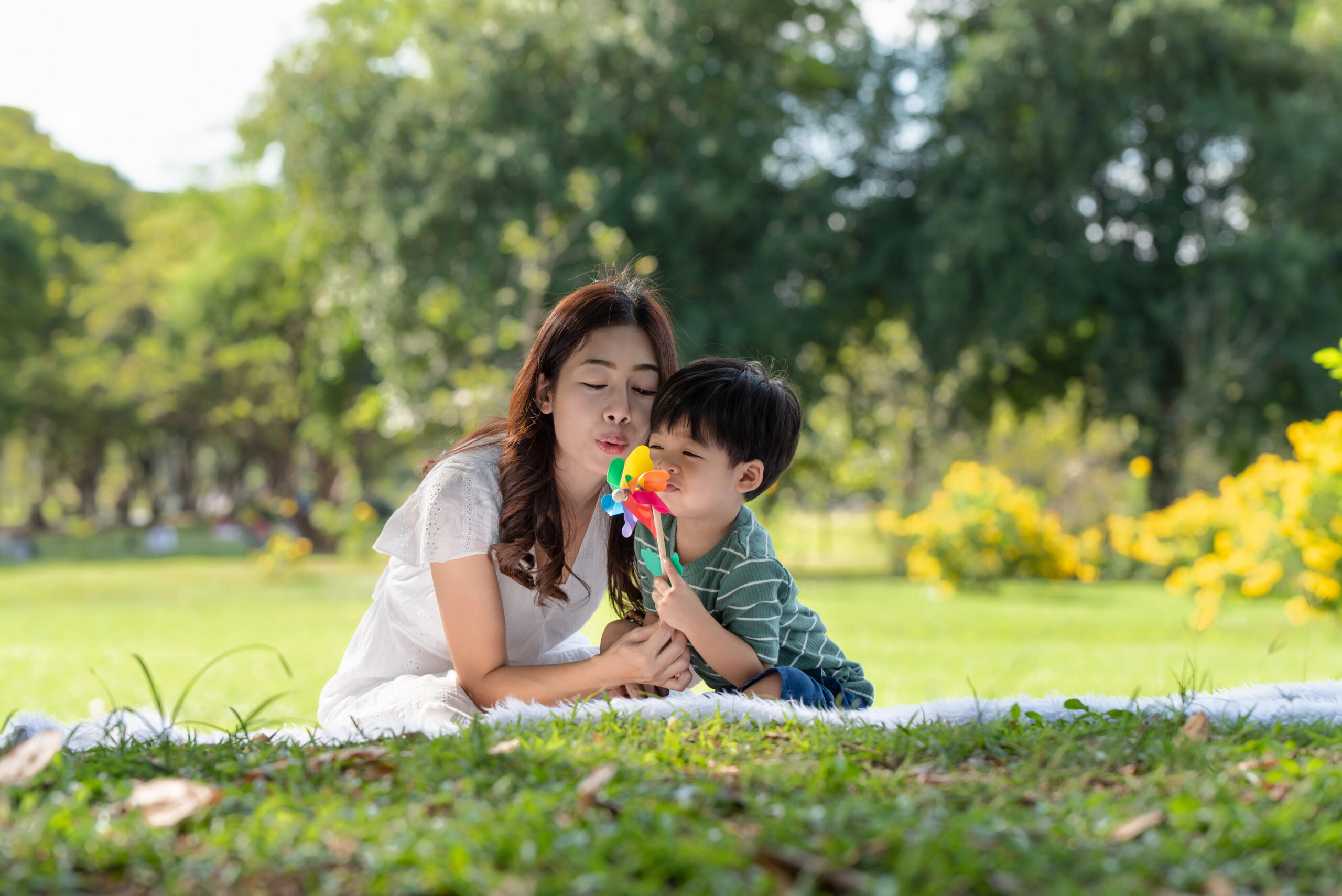 Mother and young son in the park