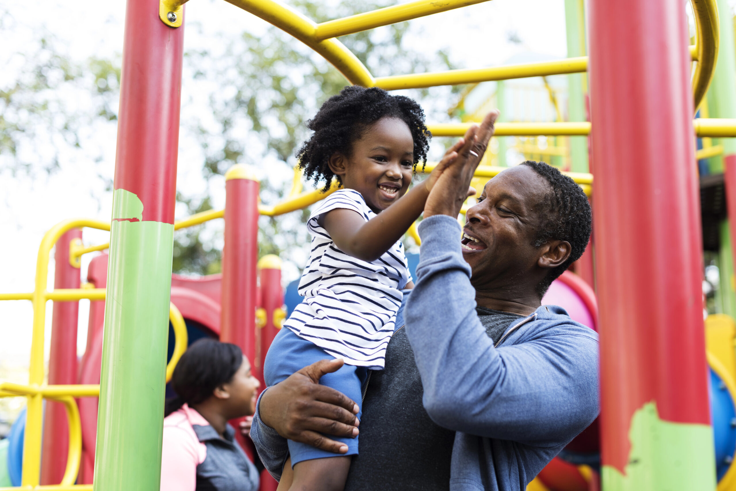 dad and child at playground