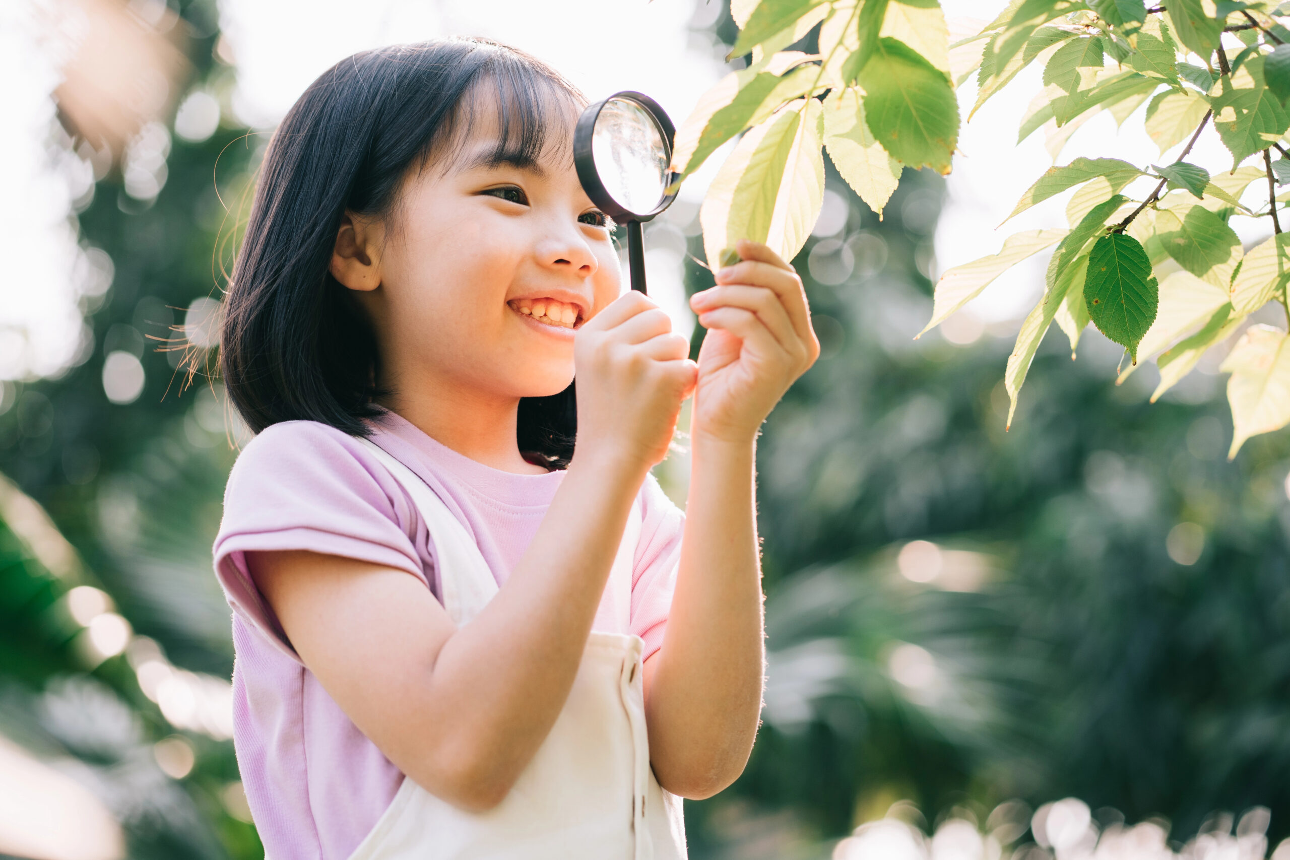 young girl looking at nature